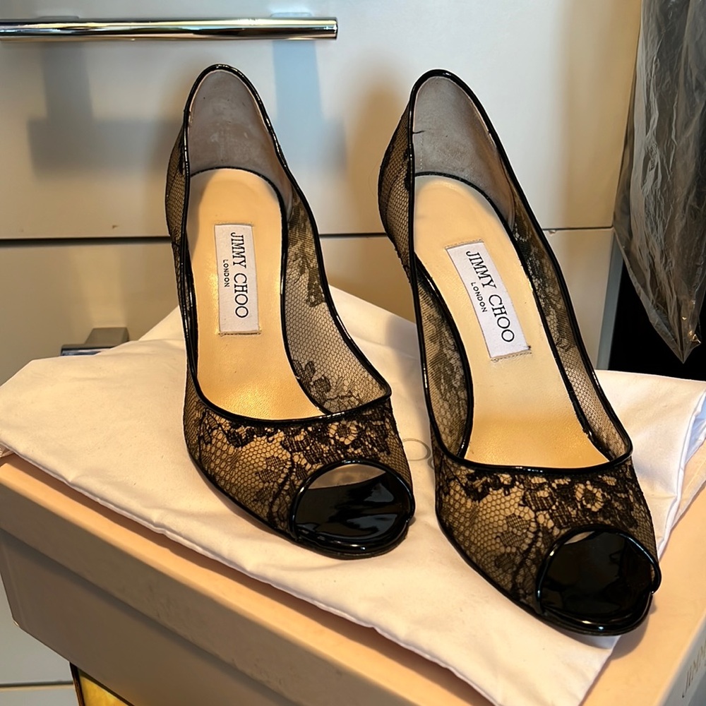 Gently used Jimmy Choo black Evelyn lace peep toe heels in size 38
